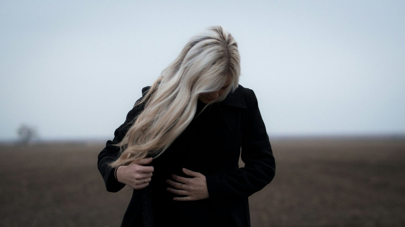 woman wearing black coat